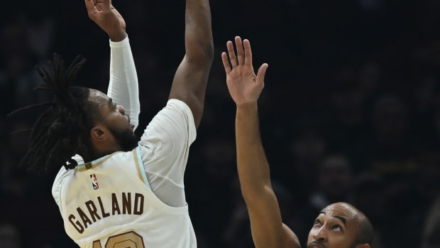 Cleveland Cavaliers guard Darius Garland (10) shoots over the defense of Minnesota Timberwolves guard Jordan McLaughlin (6) during the first half at Rocket Mortgage FieldHouse.